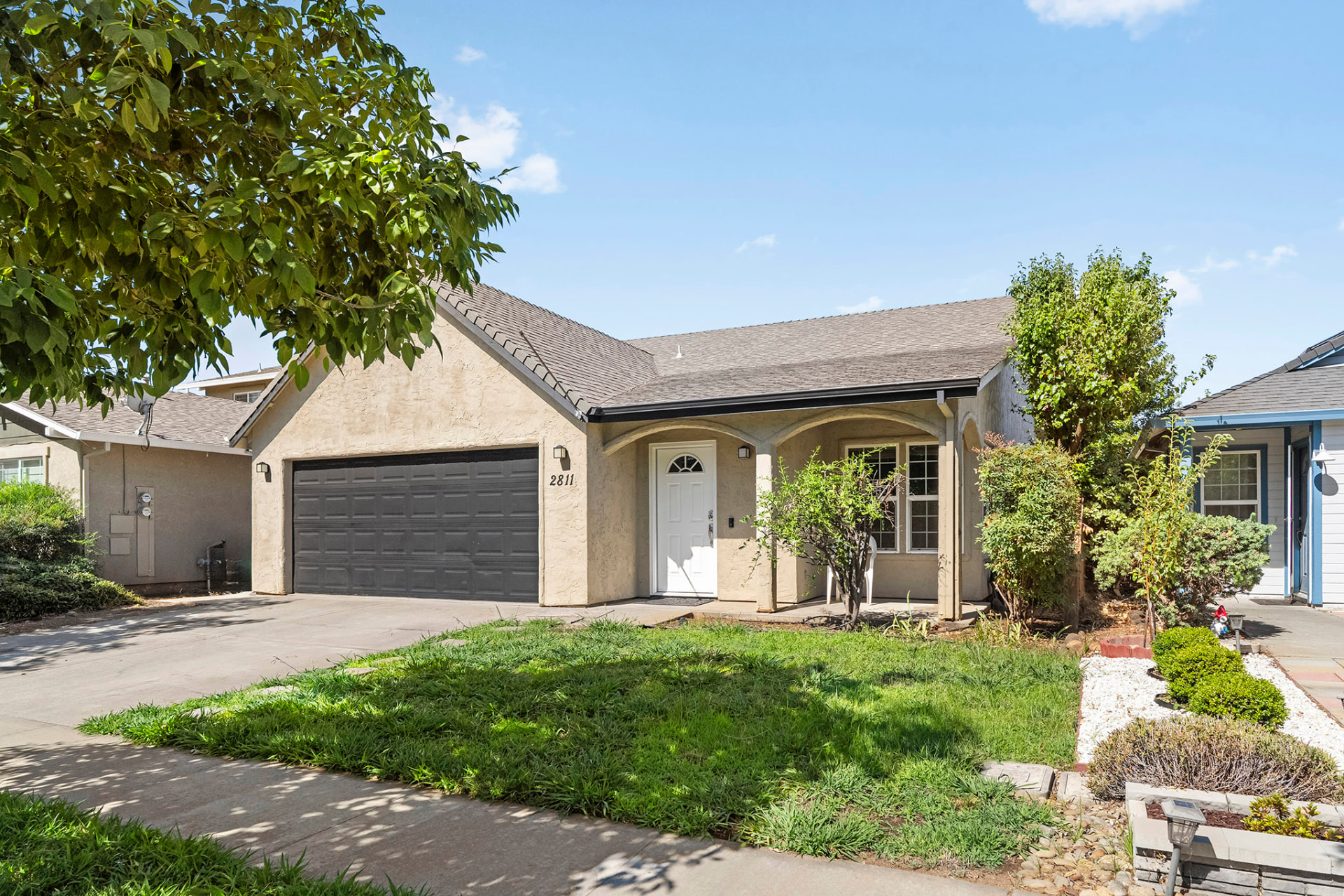 Angled view of the front of the home and driveway